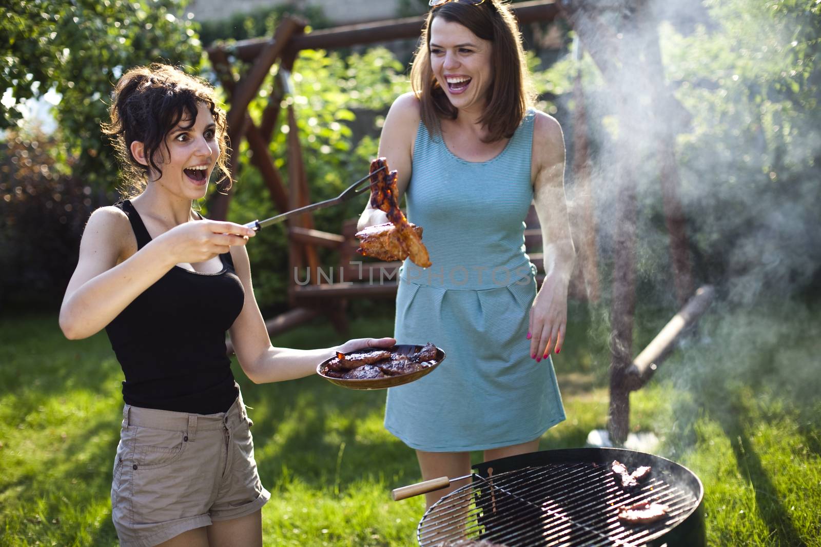 Two girls on grill, natural colorful tone by JanPietruszka