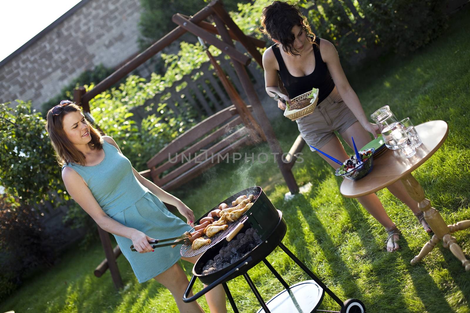 Two girls on grill, natural colorful tone