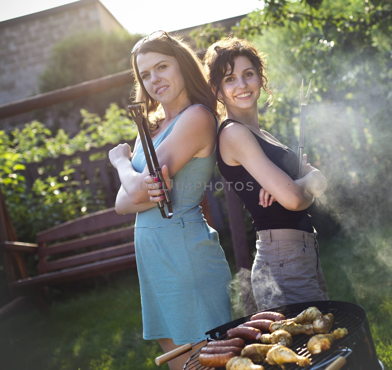 Two girls on grill, natural colorful tone by JanPietruszka