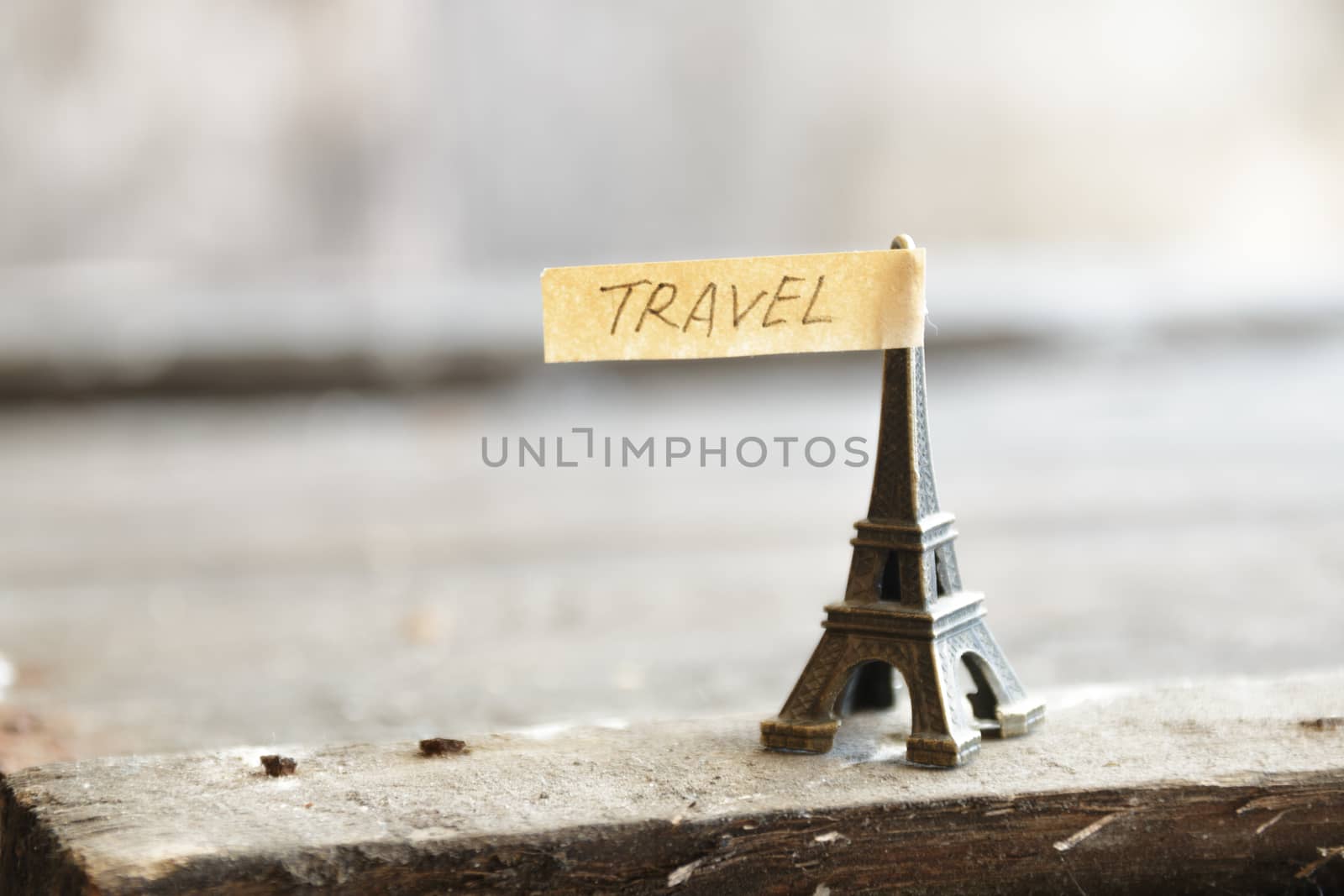 travel concept, Eiffel tower and  inscription "travel", place for text, soft focus