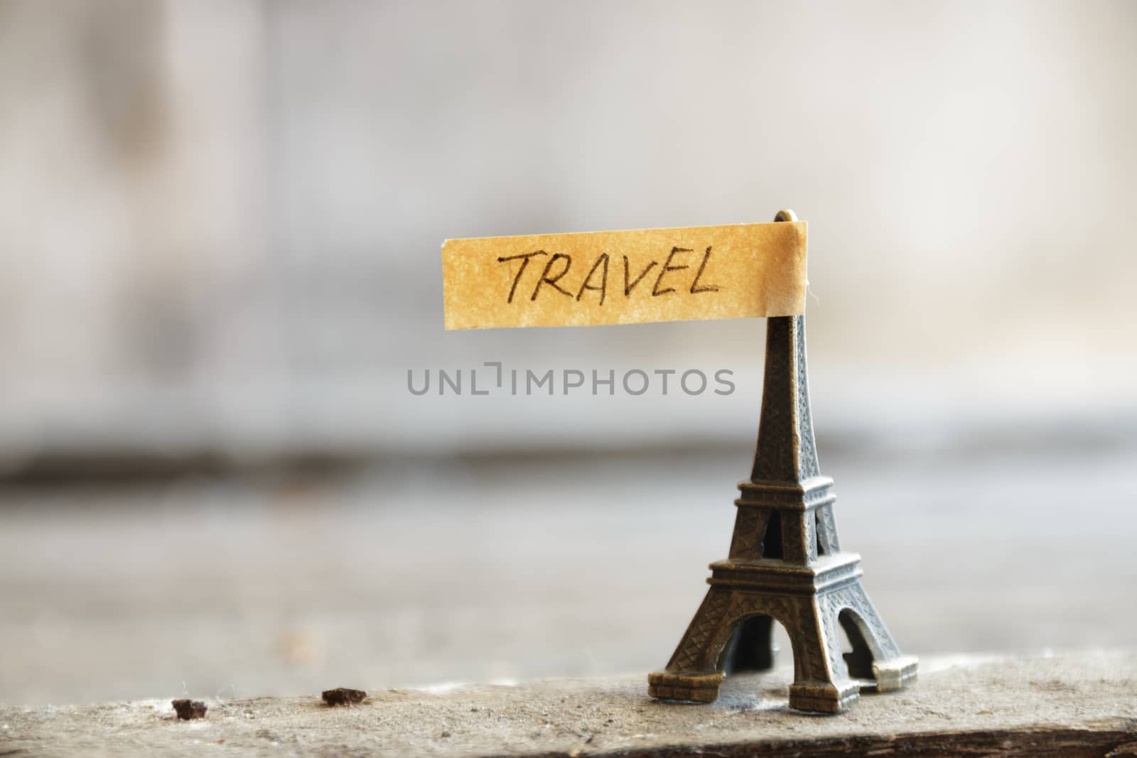 travel concept, Eiffel tower and  inscription "travel", place for text, soft focus