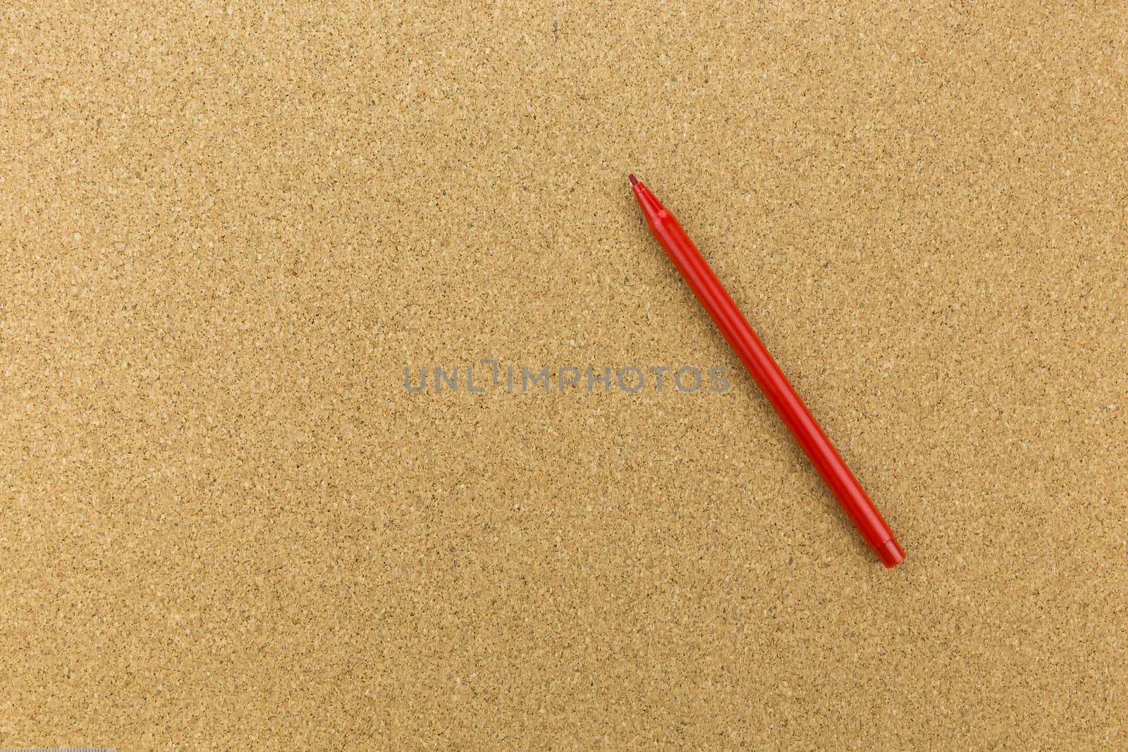 red marker on cork board by urubank