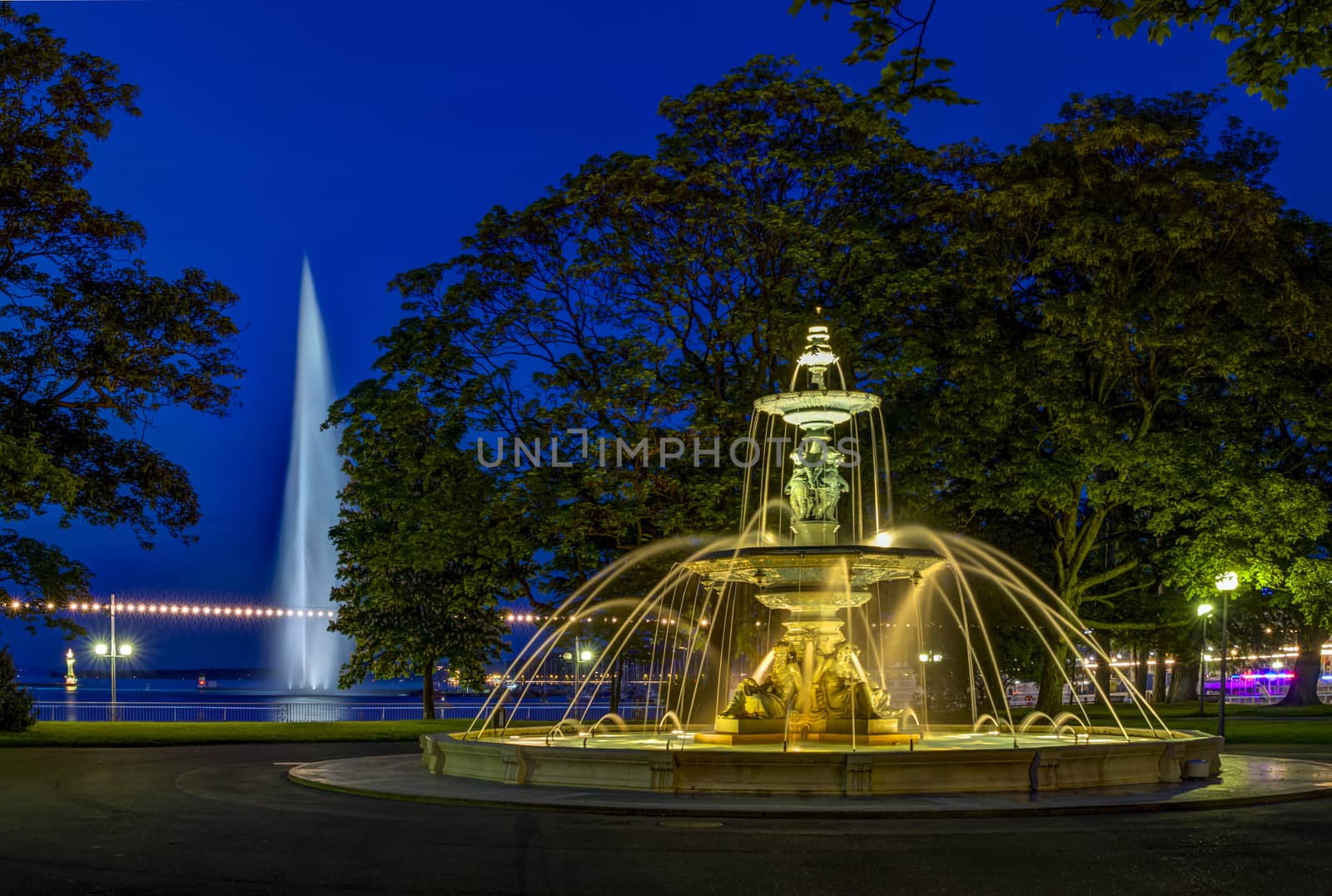 Fountain at the English garden by night in Geneva, Switzerland, HDR