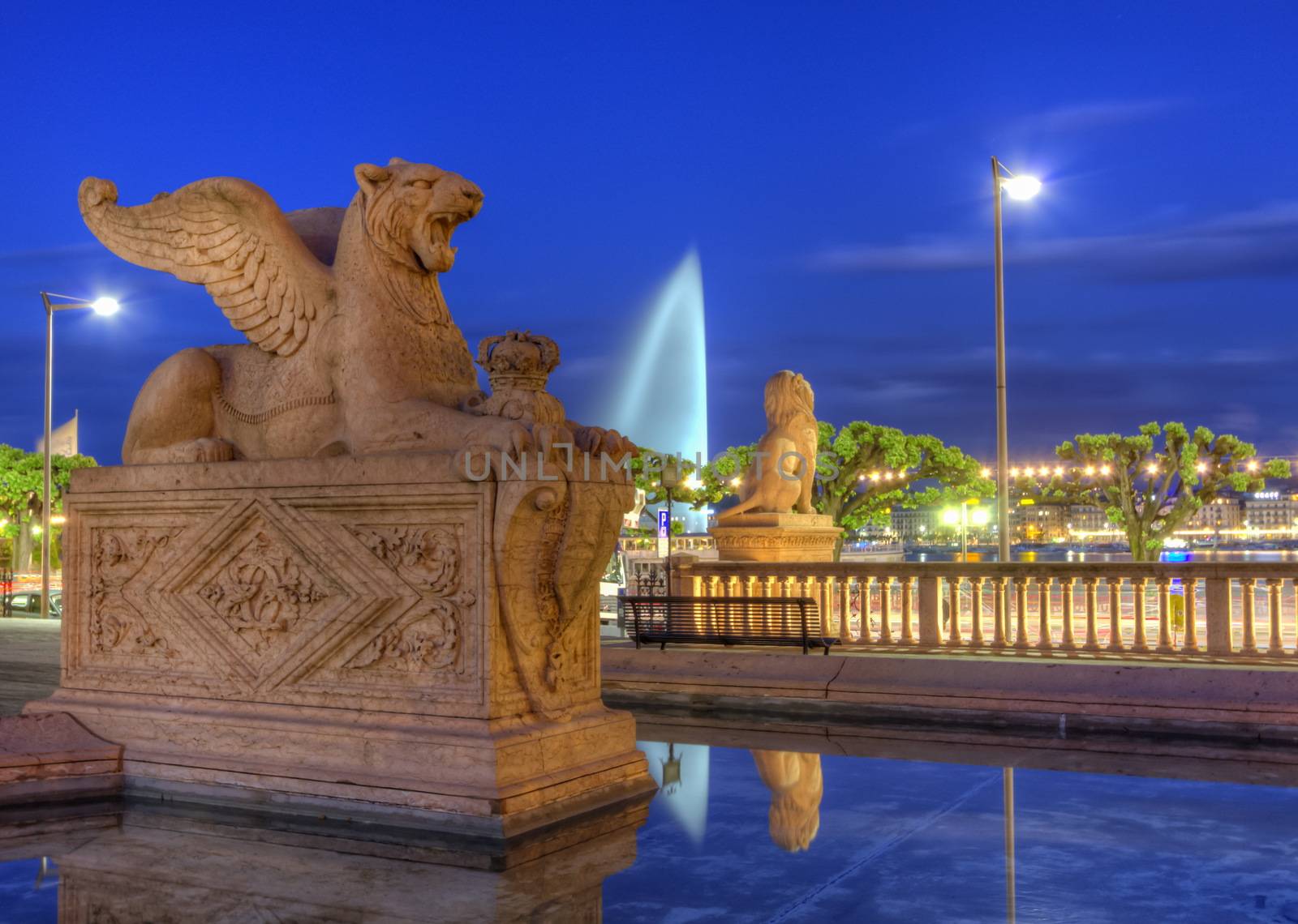 Lion statue near Brunswick monument by night in Geneva, Switzerland, HDR