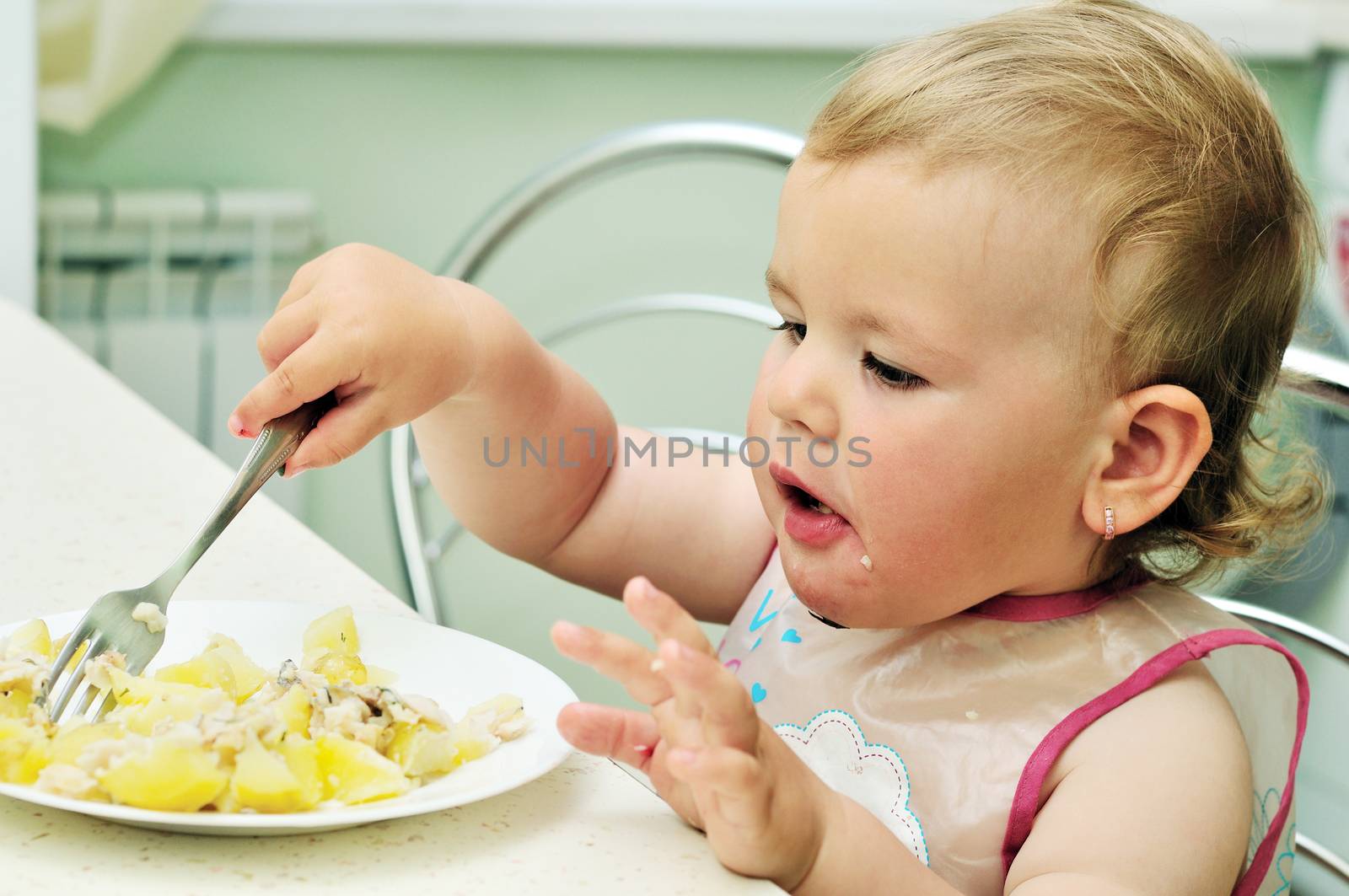 baby with fork by Reana