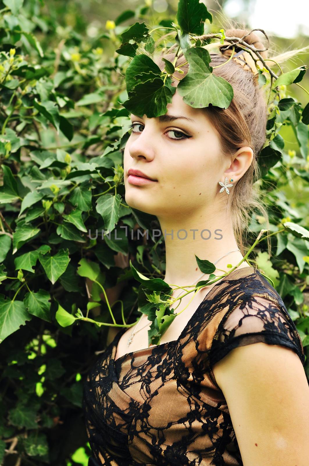 forest awesome  nymph - beautiful girl in the green leaves 