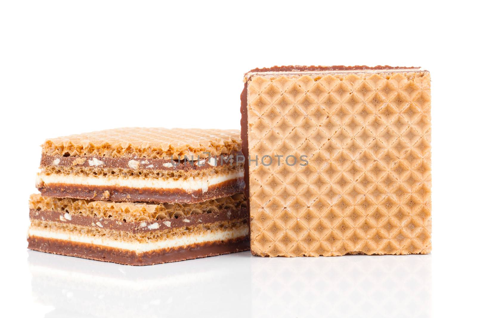 Wafers with chocolate on a white background by motorolka