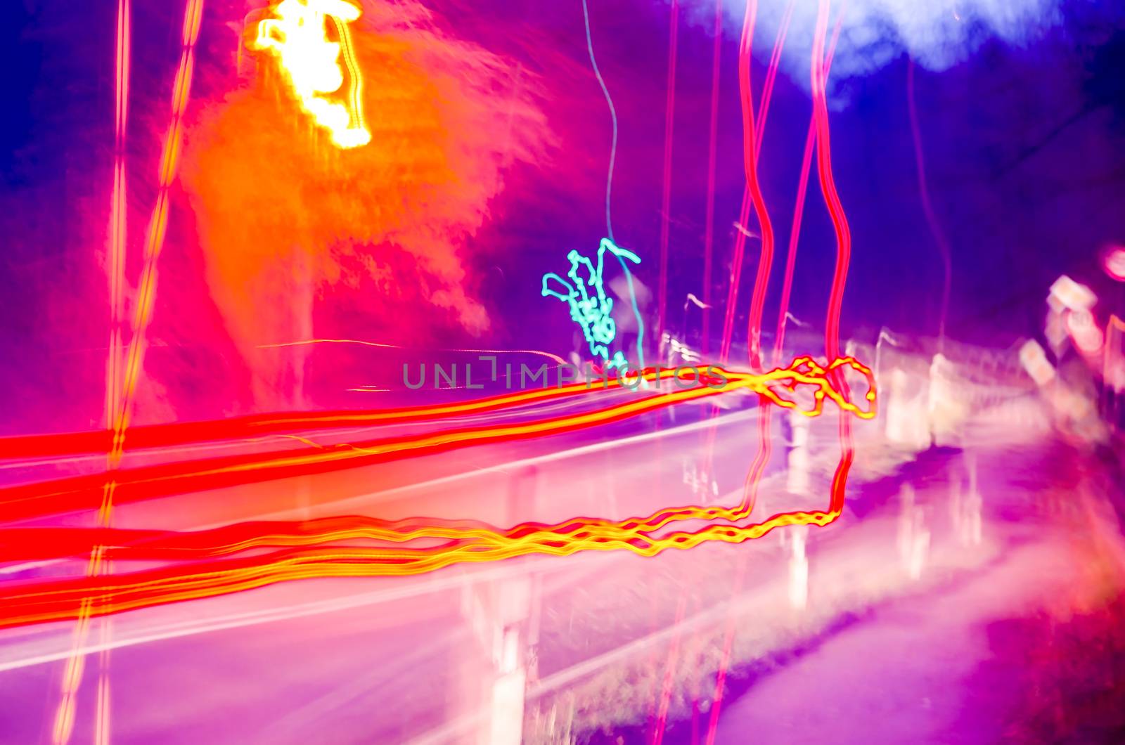 Long exposure of a vehicle traveling at night.
