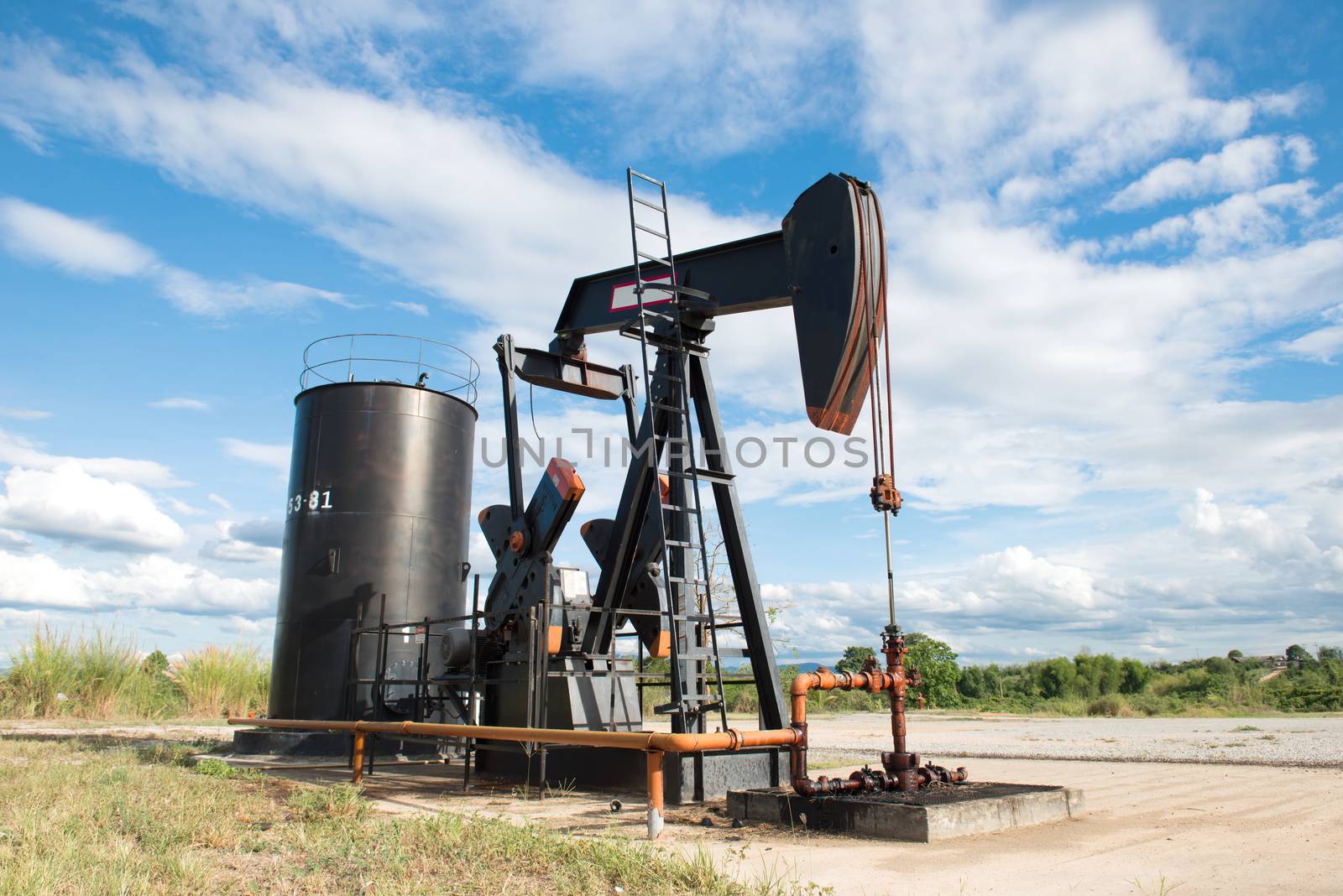 pumpjack pumping crude oil from oil well