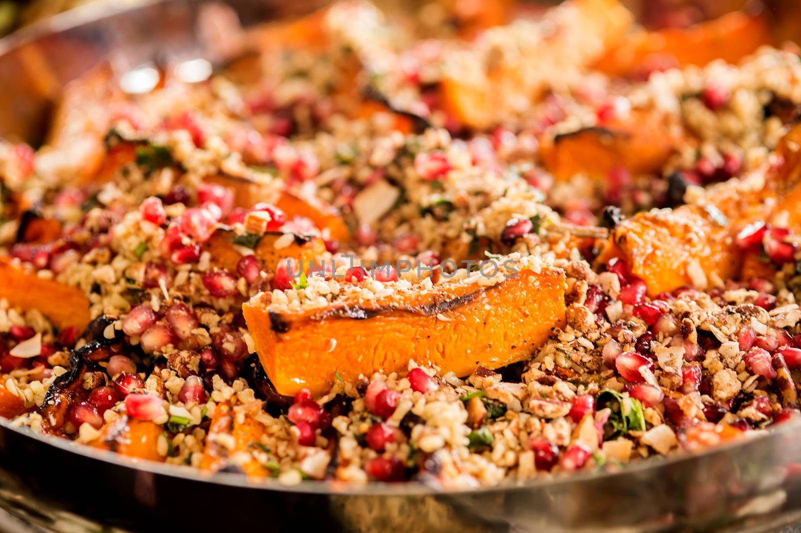 Healthy salad with quinoa and pomegranate  by stockyimages