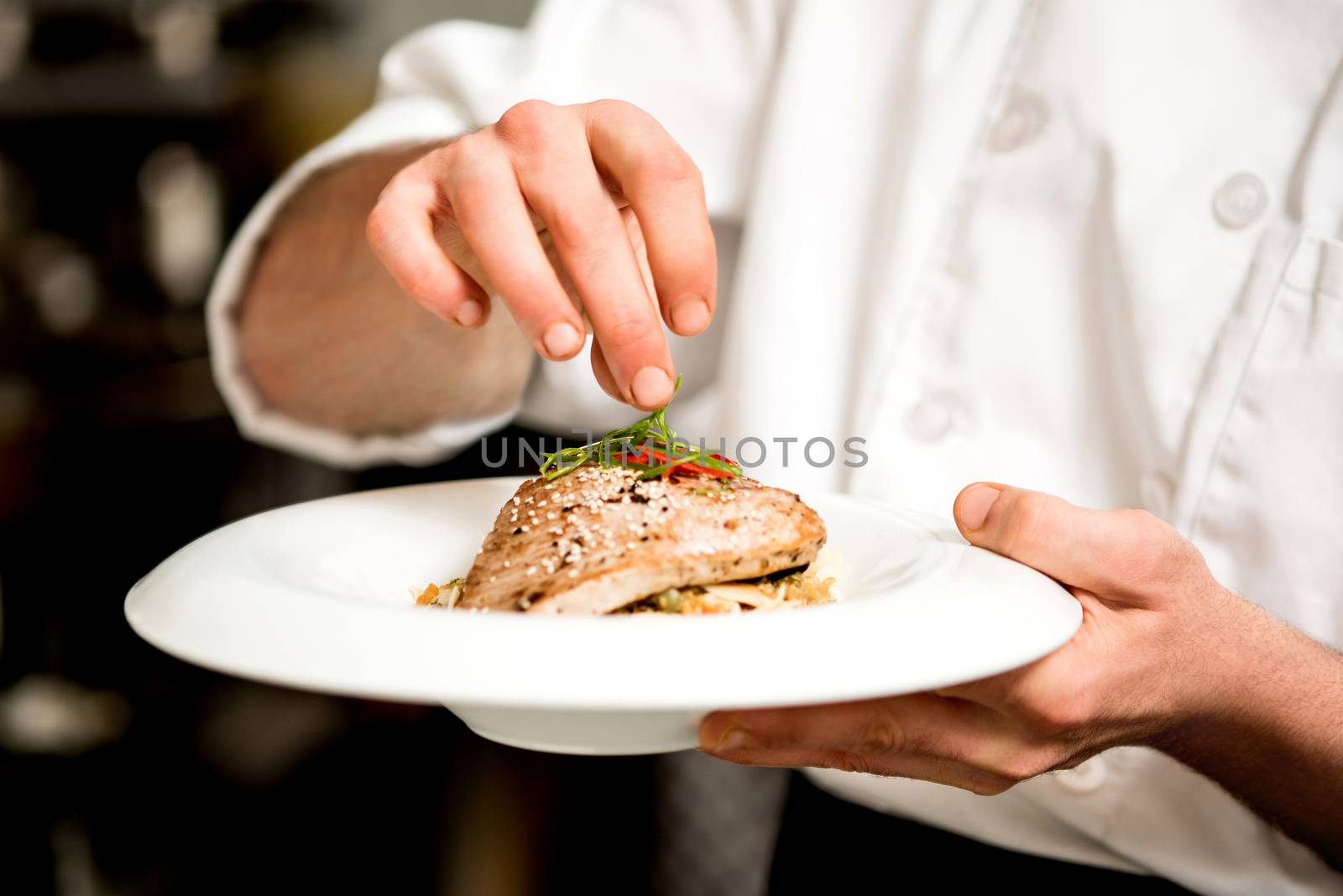 Chef is preparing appetizer on kitchen