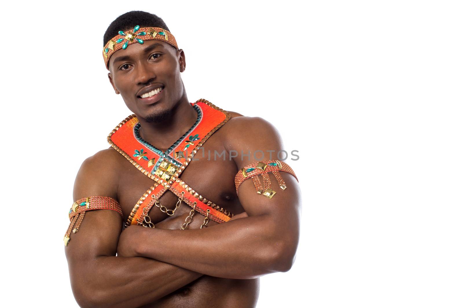 Male samba dancer posing with crossed arms