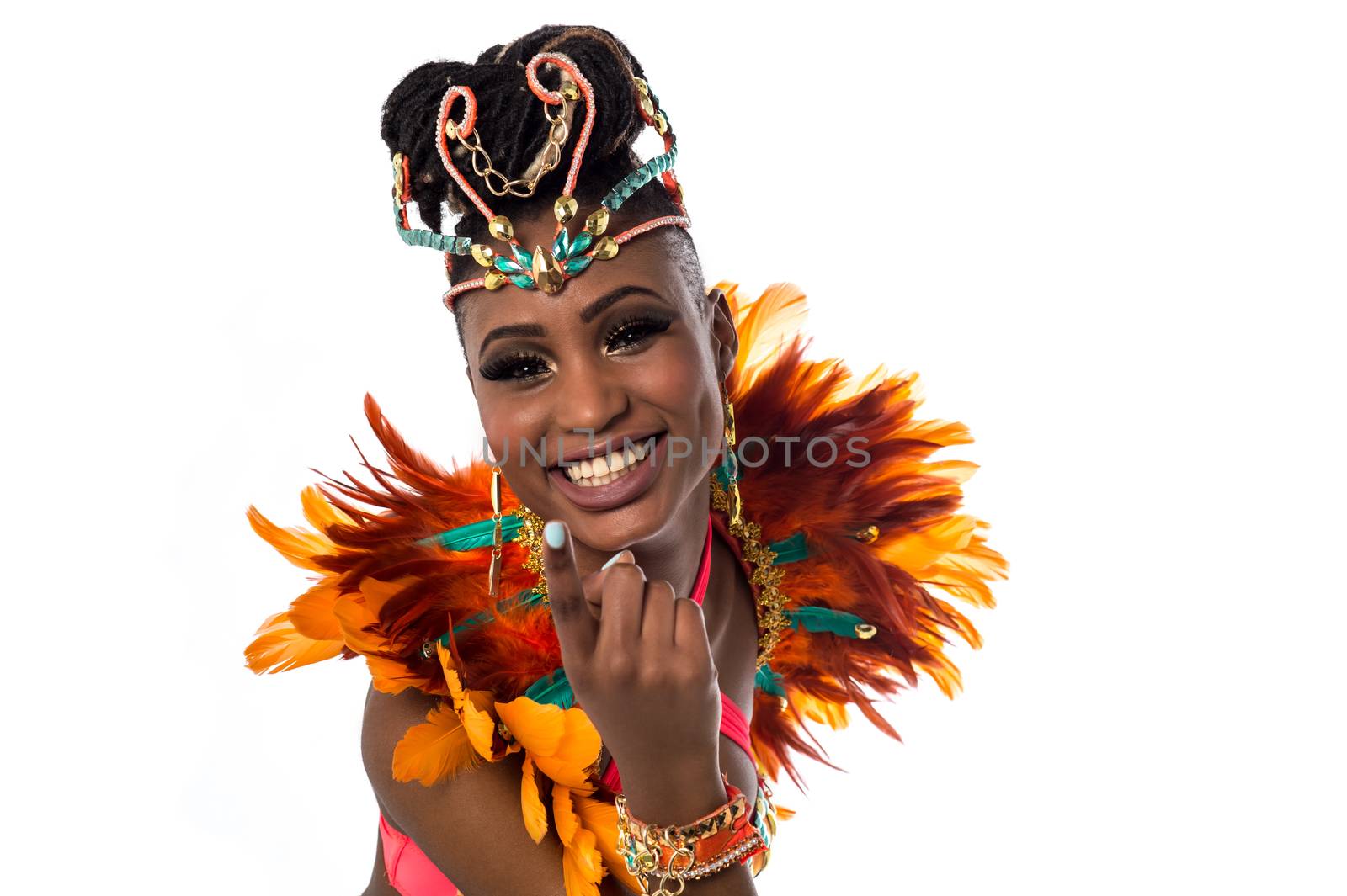 Smiling carnival costumed woman over white