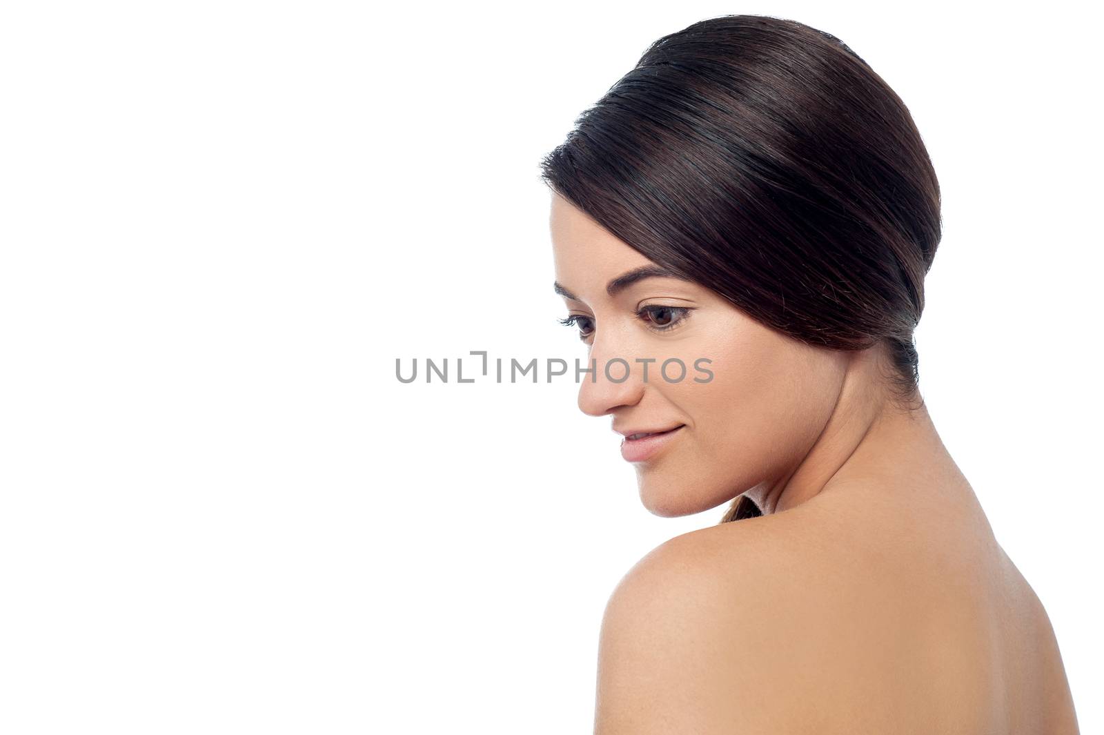 Topless beautiful woman posing over white