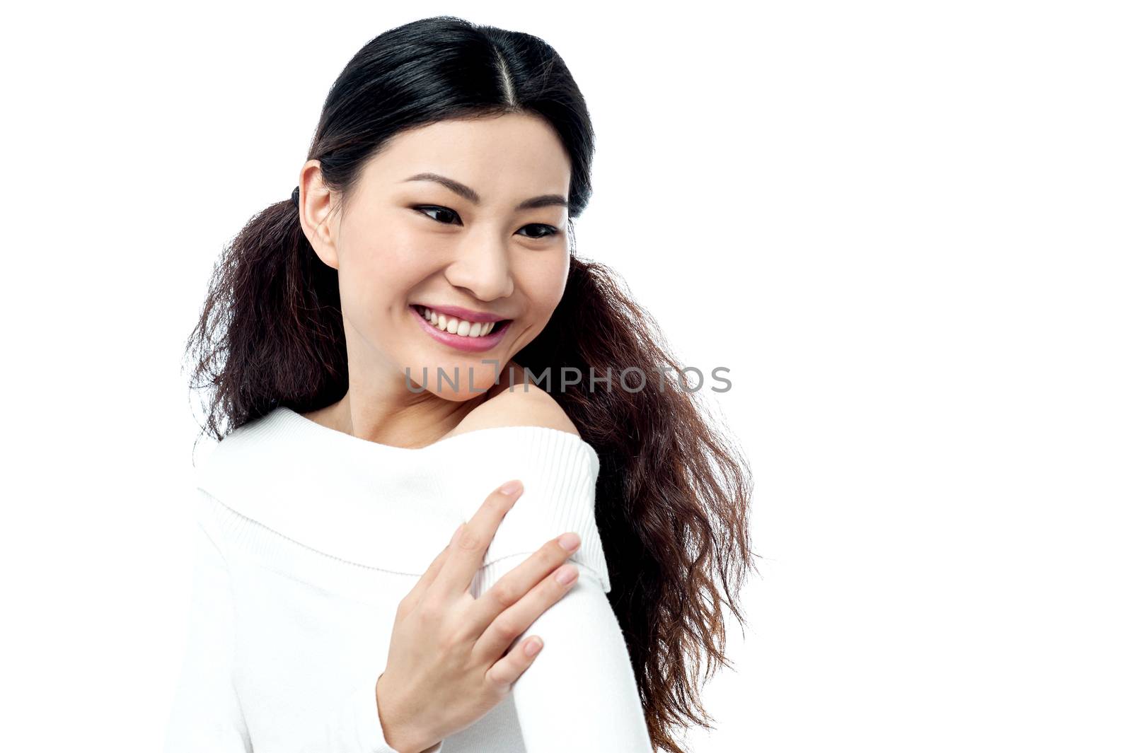 Trendy young woman posing over white