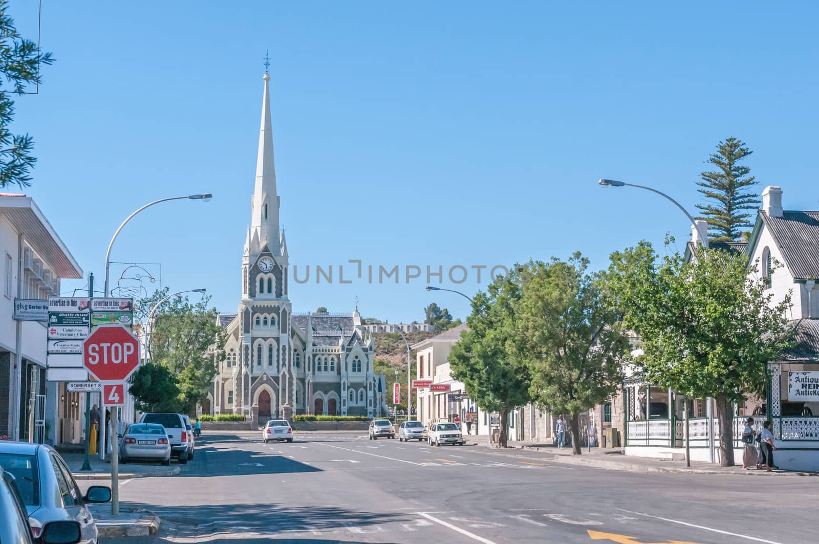 GRAAFF REINET, SOUTH AFRICA - JANUARY 6, 2015: Late afternoon street scene.  The Dutch Reformed Church, built 1885-1887, is one of more than 200 buildings in the town declared as a national monument