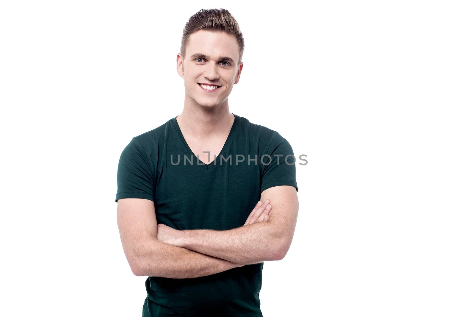 Casual young man looking at camera by stockyimages