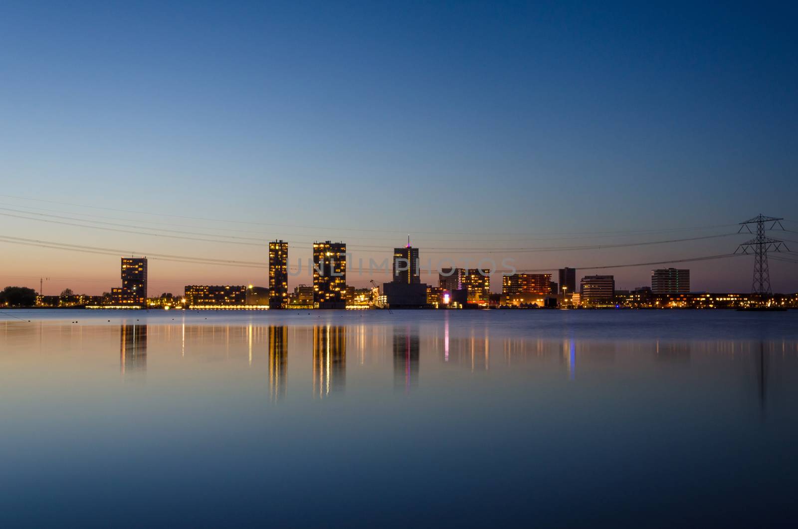 skyline of the modern city center of Almere, Flevoland, The Netherlands. Twilight time.