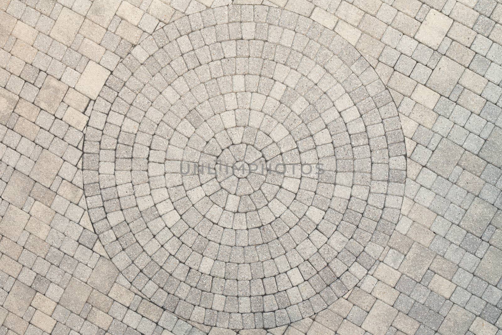 Center view of patio pavers circle design overhead view. Showing well detail  cutted edges to match to the circle design