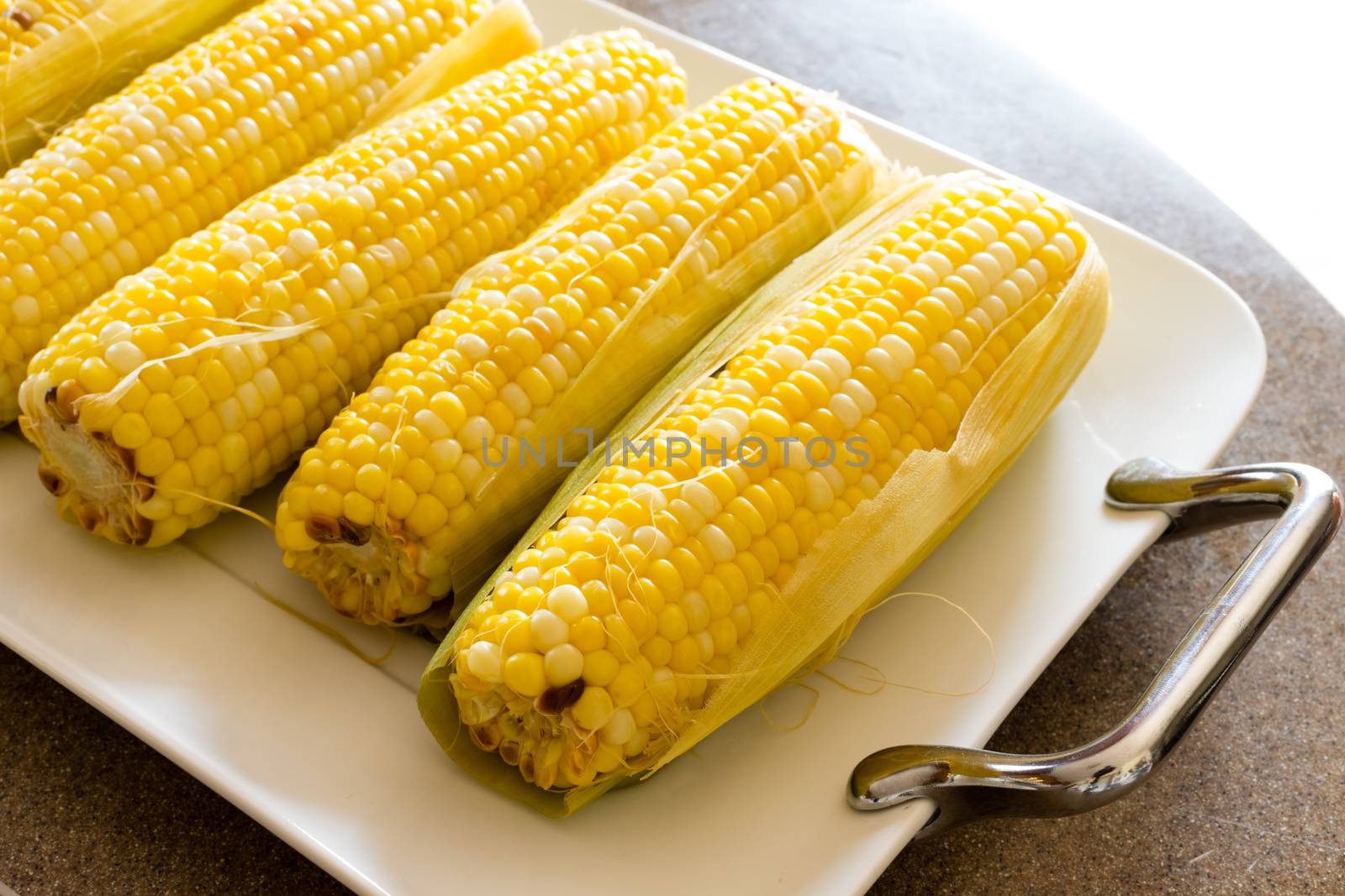 Tasty boiled fresh corncobs for a healthy snack by coskun