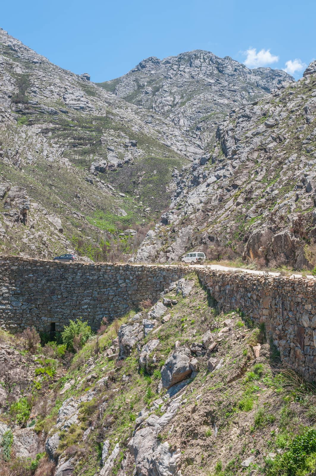 SWARTBERG PASS, SOUTH AFRICA - JANUARY 2, 2015: Built out part of the historic Swartberg (Black Mountain) Pass showing the intricate stonework. The pass is a declared national monument.