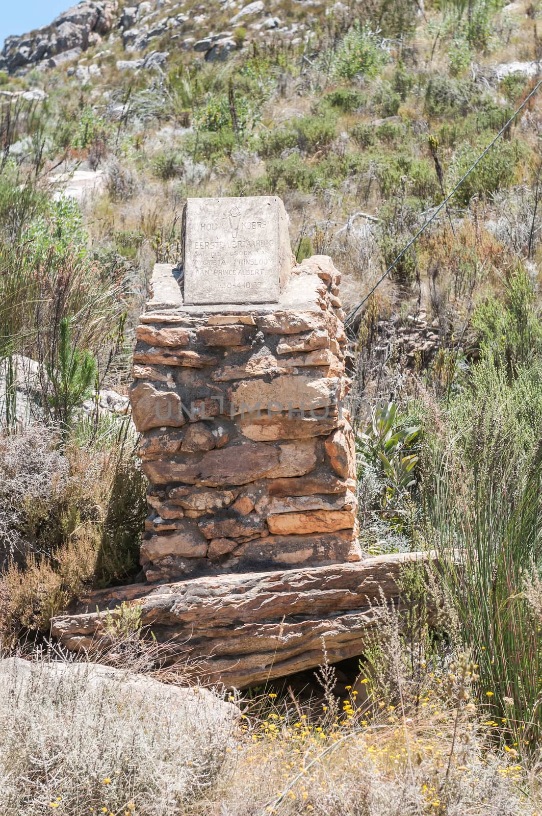 SWARTBERG PASS, SOUTH AFRICA - JANUARY 2, 2015: Weathered memorial to the visit of an oxwagon named Magrieta Prinsloo in 1938 to celebrate the centenary of the Big Trek