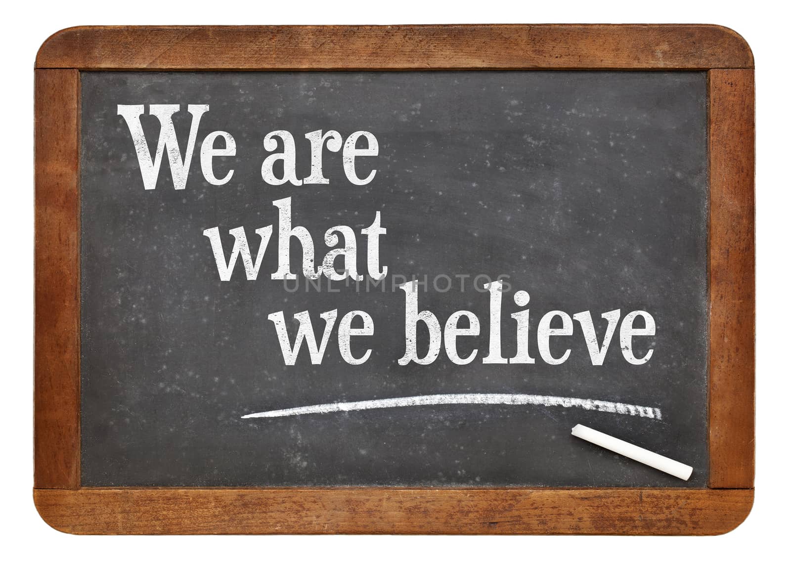 We are what believe on balckboard by PixelsAway