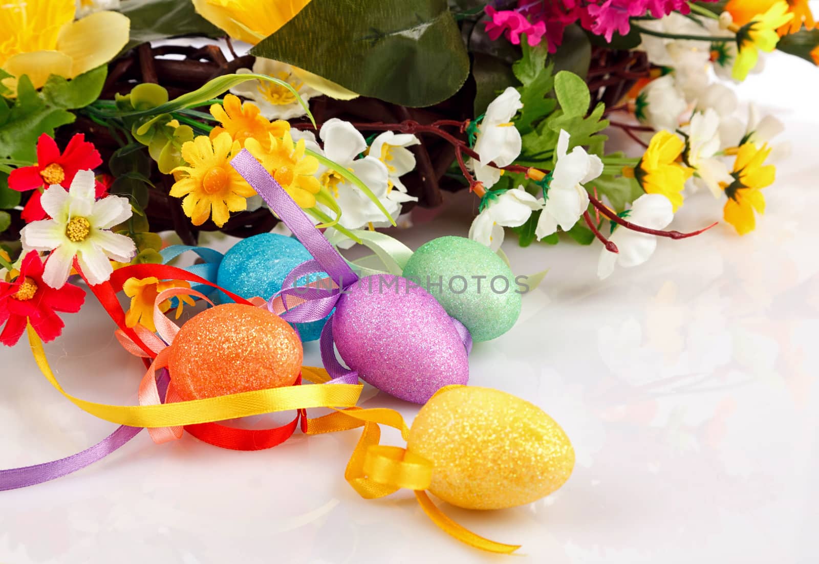 Easter eggs with flowers on a white background