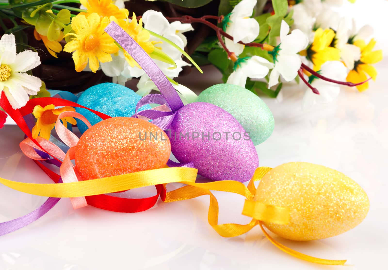 Easter eggs with flowers on a white background