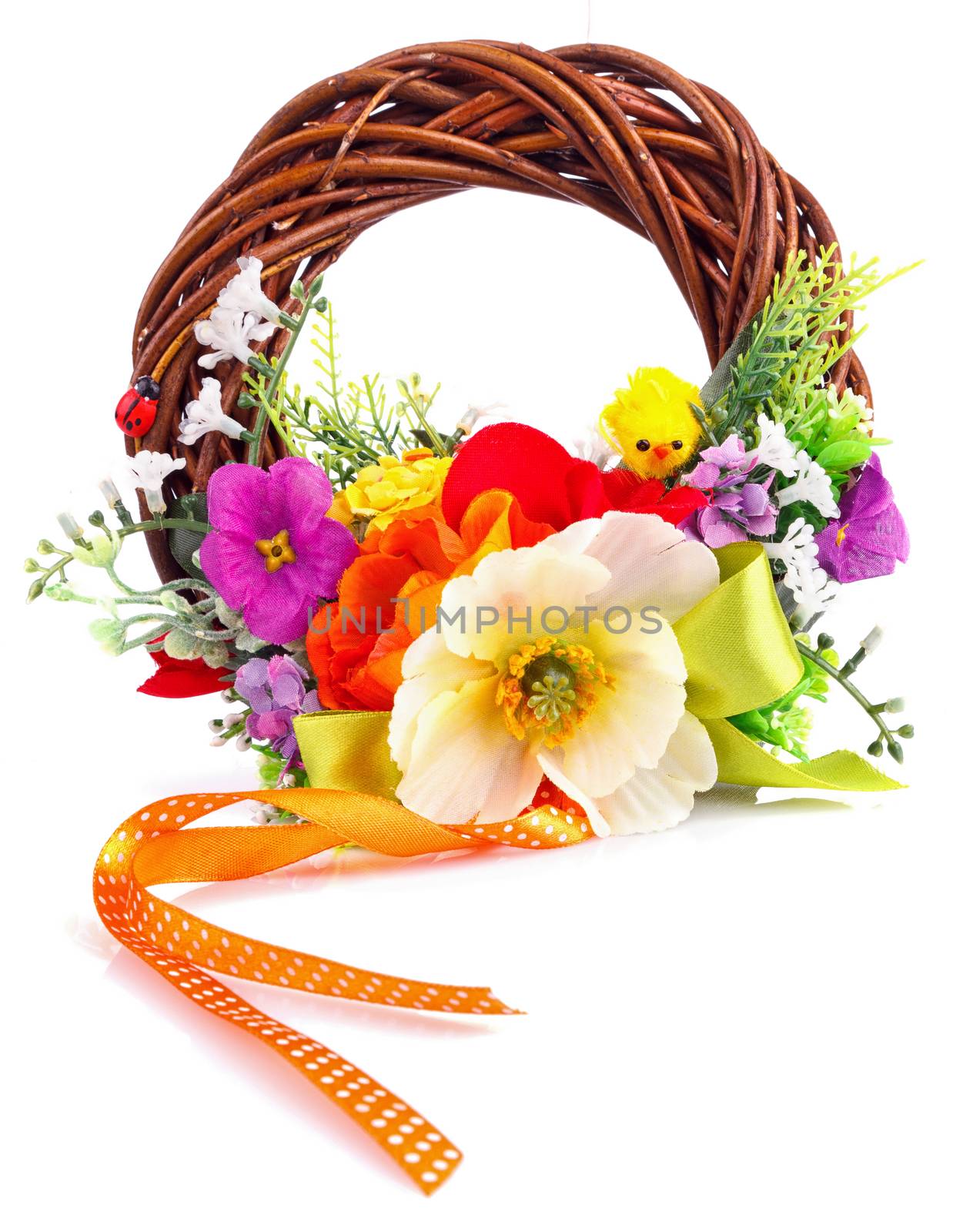 wreath of twigs and flower composition isolated on white