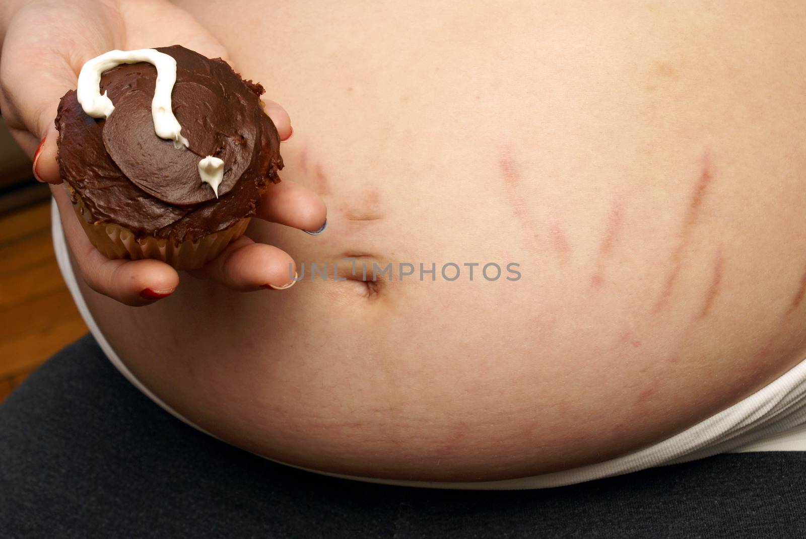 Photo 4 of an event held in revealing the gender of a new mothers baby done in a unique photo series using mystery cupcakes to let people know if its a boy or girl.