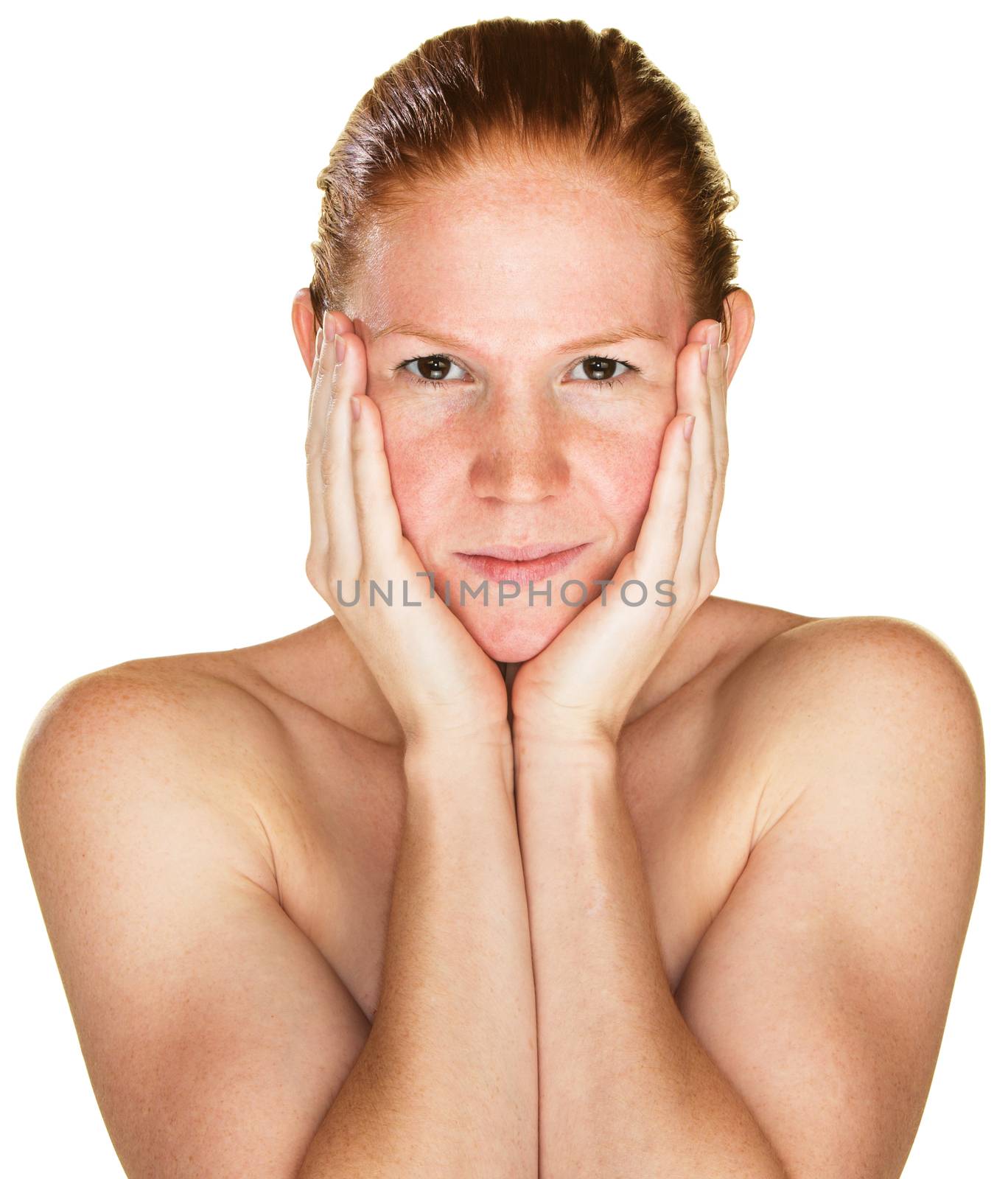 Isolated sultry young Caucasian female holding her face