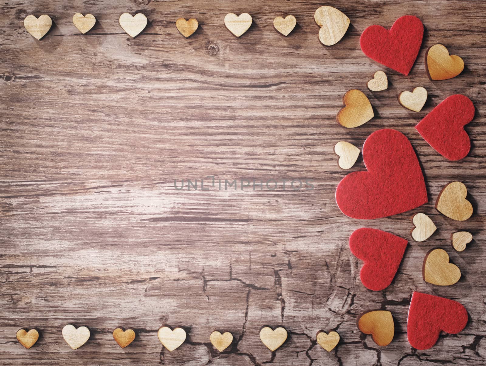 hearts on old wooden background