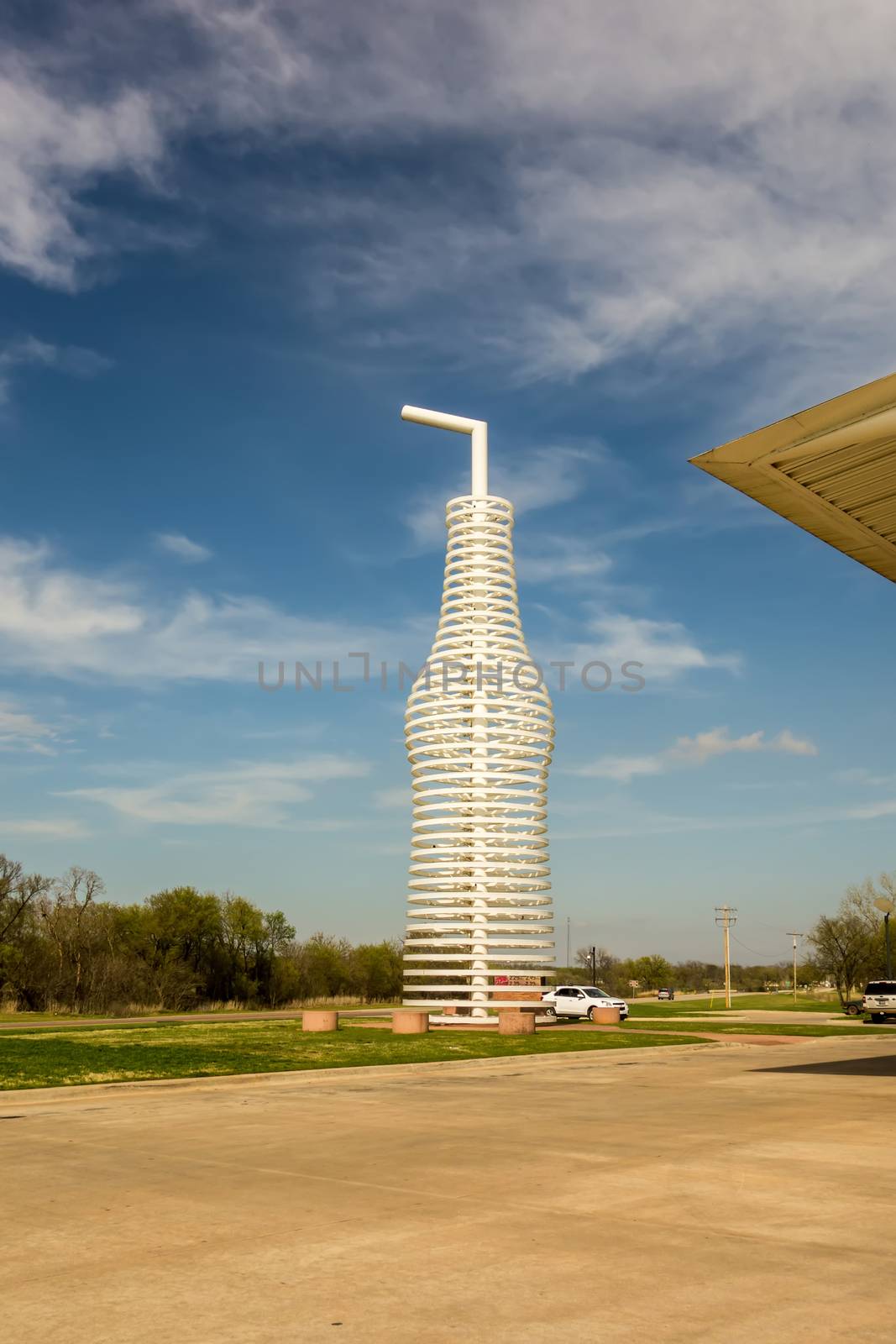 giant landmark of a soda pops monument in arcadia oklahoma by digidreamgrafix