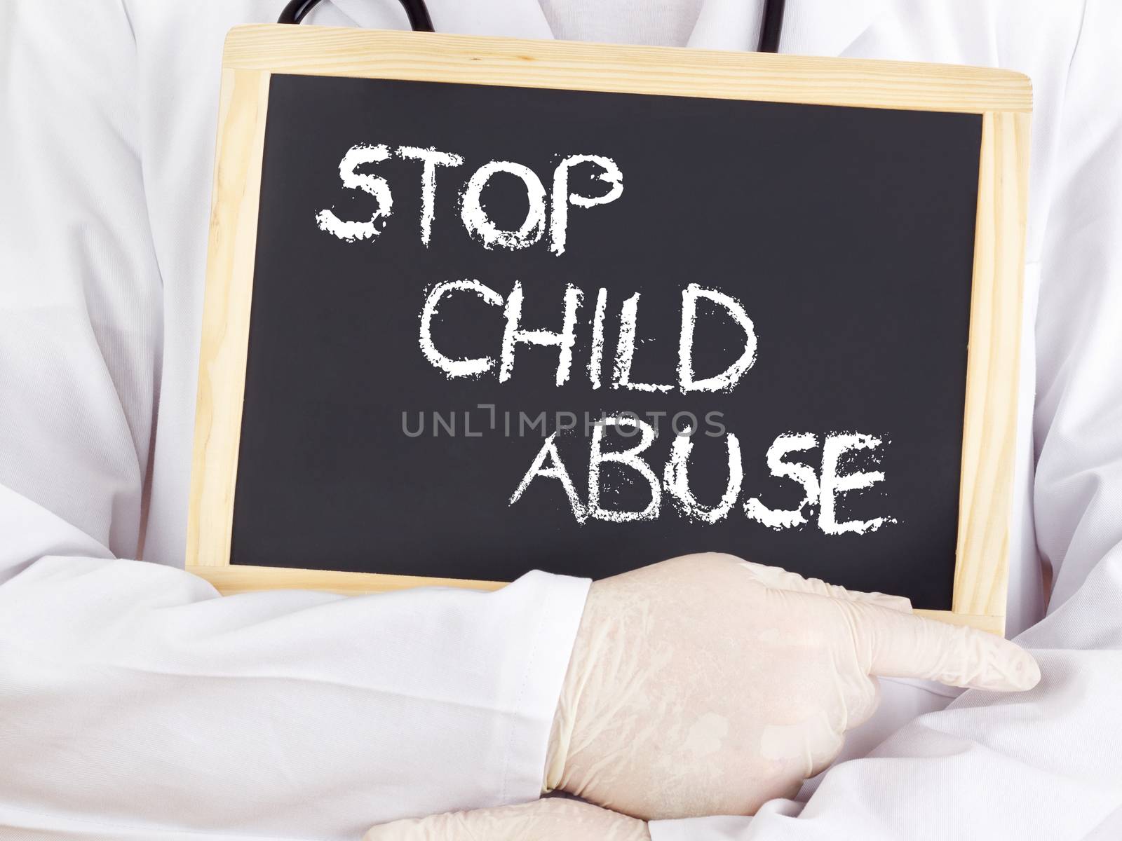 Doctor shows information: Stop Child Abuse by gwolters