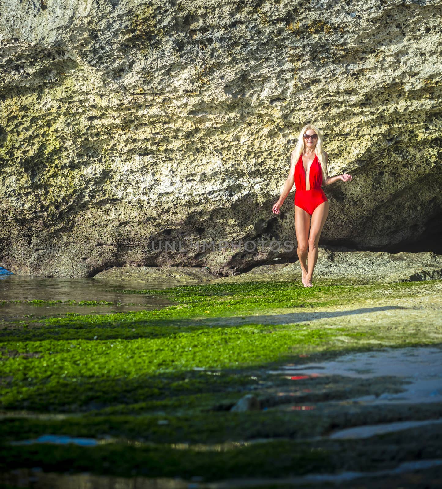 Young Woman in Bikini in Tropical Island
released