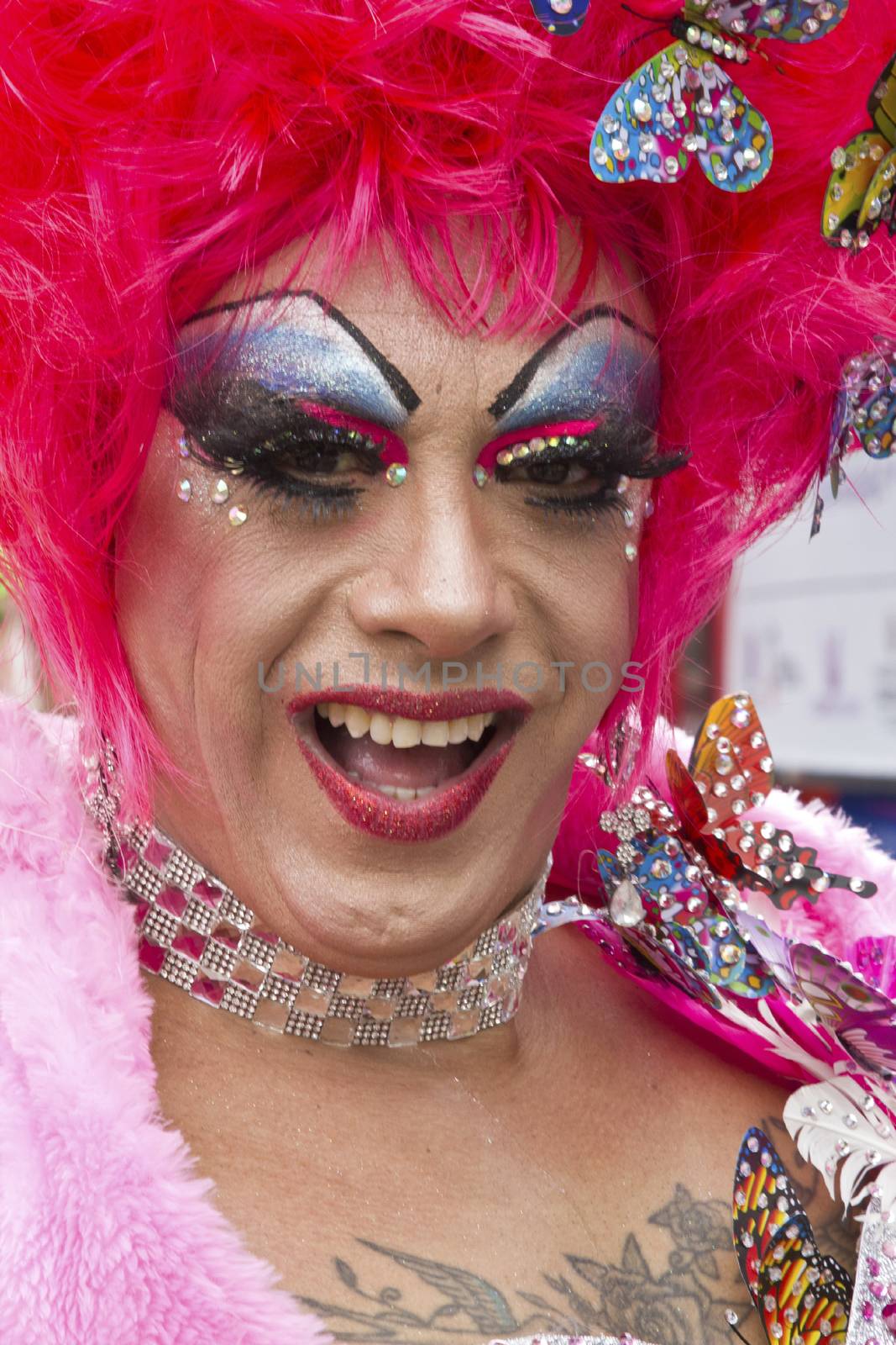 SAO PAULO, BRAZIL - June 7, 2015: An unidentified Drag Queen dressed in traditional costume celebrating lesbian, gay, bisexual, and transgender culture in the 19º Pride Parade Sao Paulo.