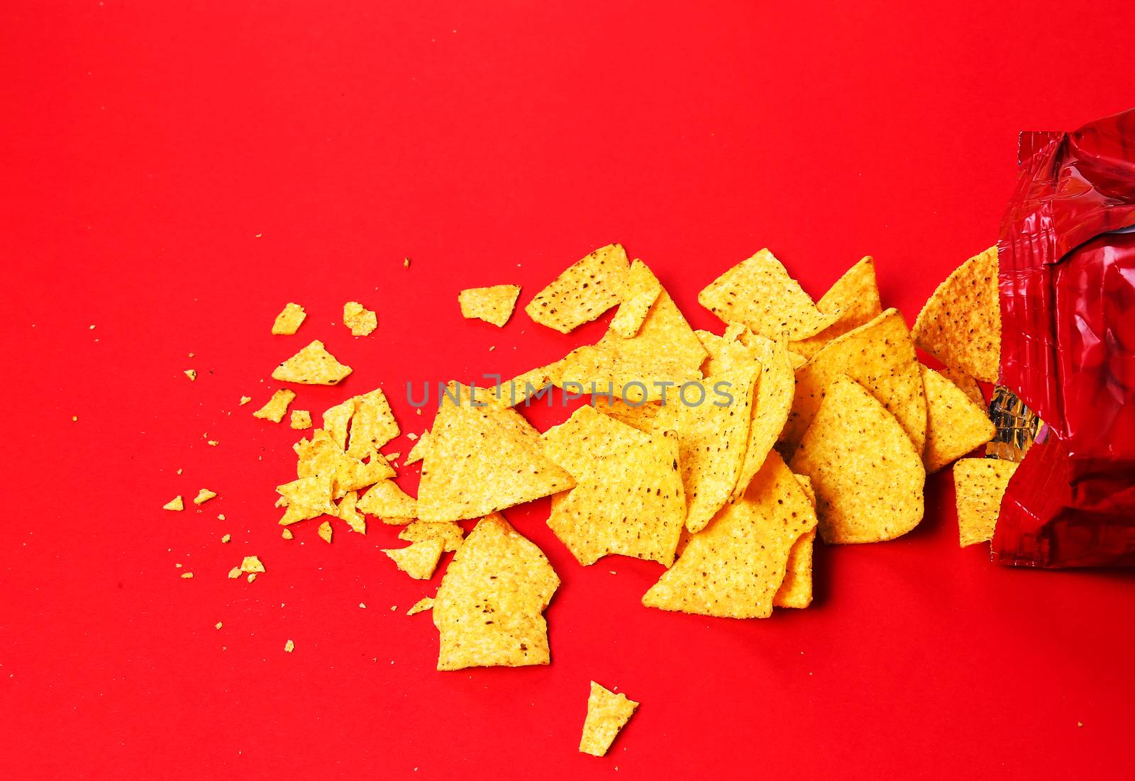 Potato chips on a red background