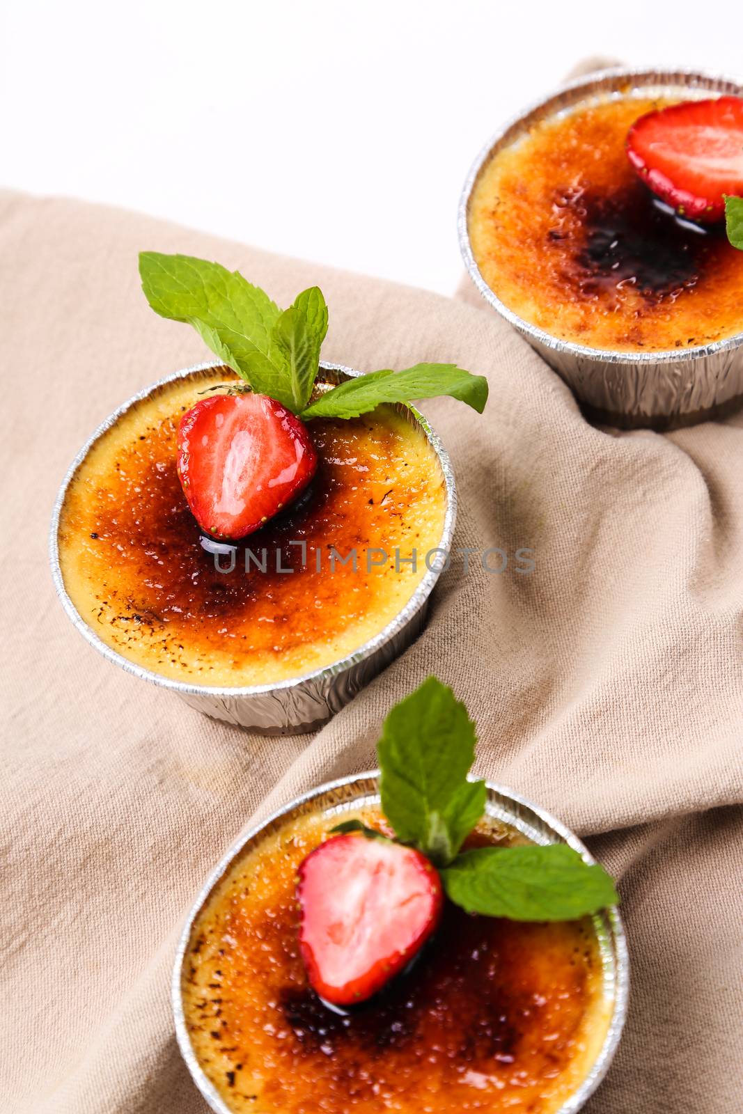 Dessert. Delicious creme brulee on the table