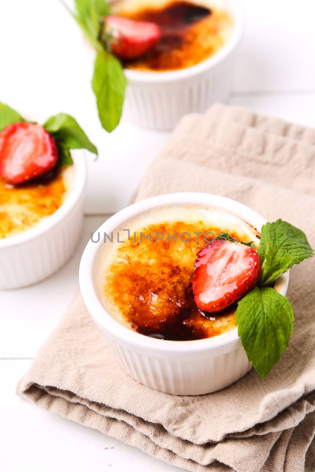 Dessert. Delicious creme brulee on the table