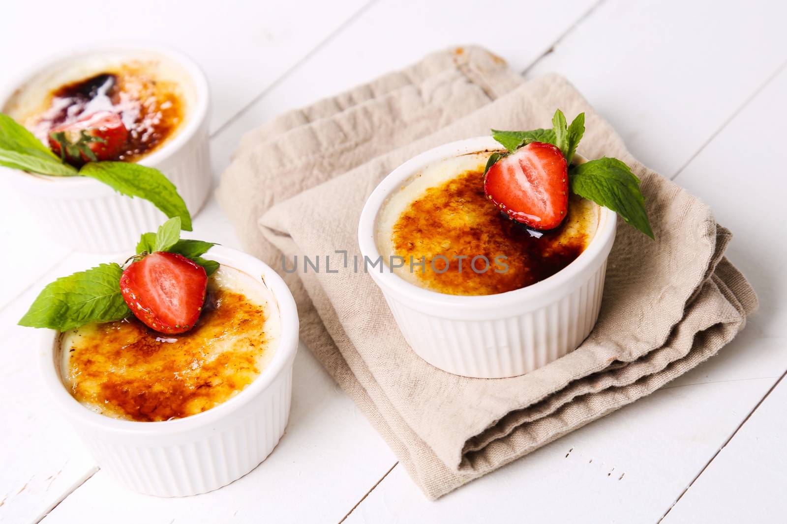 Dessert. Delicious creme brulee on the table