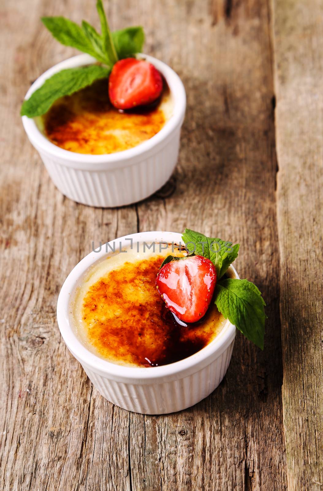 Dessert. Delicious creme brulee on the table