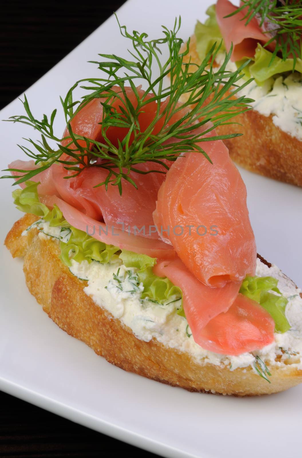 Sandwich with ricotta, pickled ginger and a slice of salted salmon