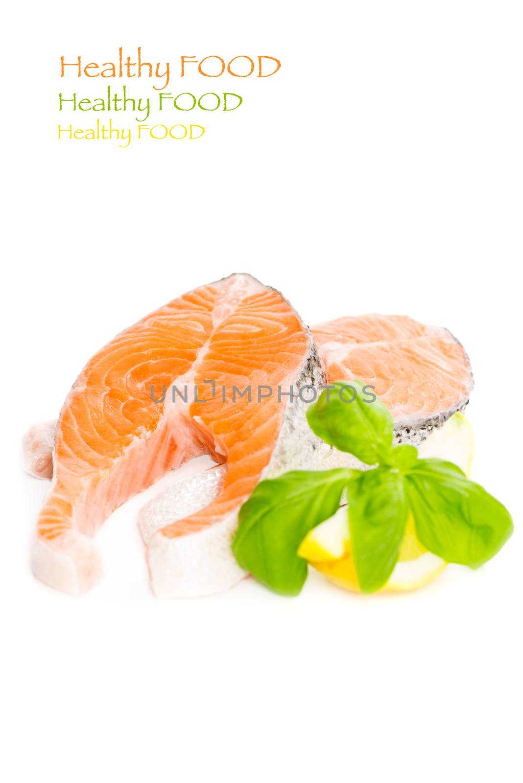 Salmon with basil and lemon isolated copy space by Nanisimova