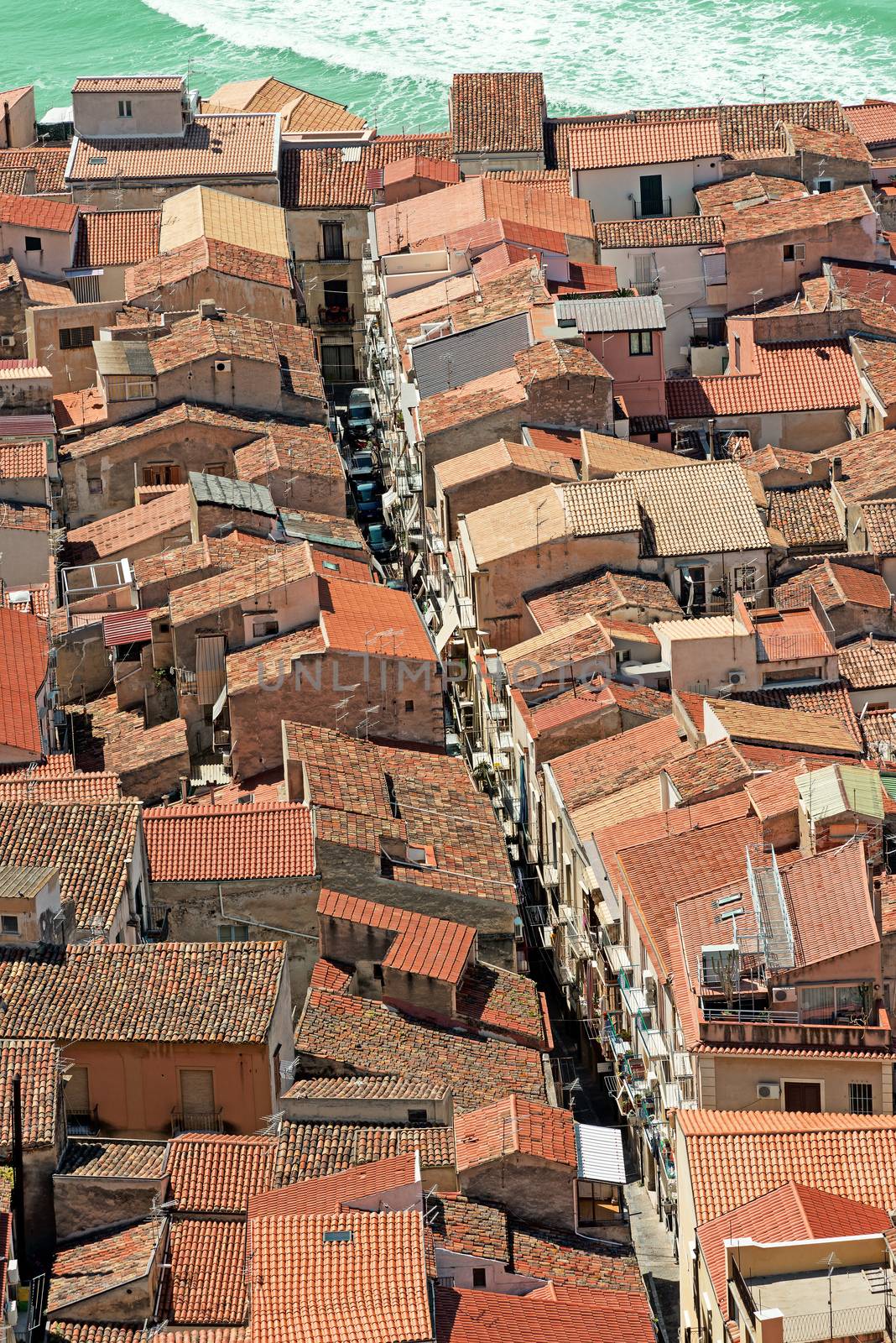 View on the Cathedral Square of Cefalu from the mountain over th by Nanisimova