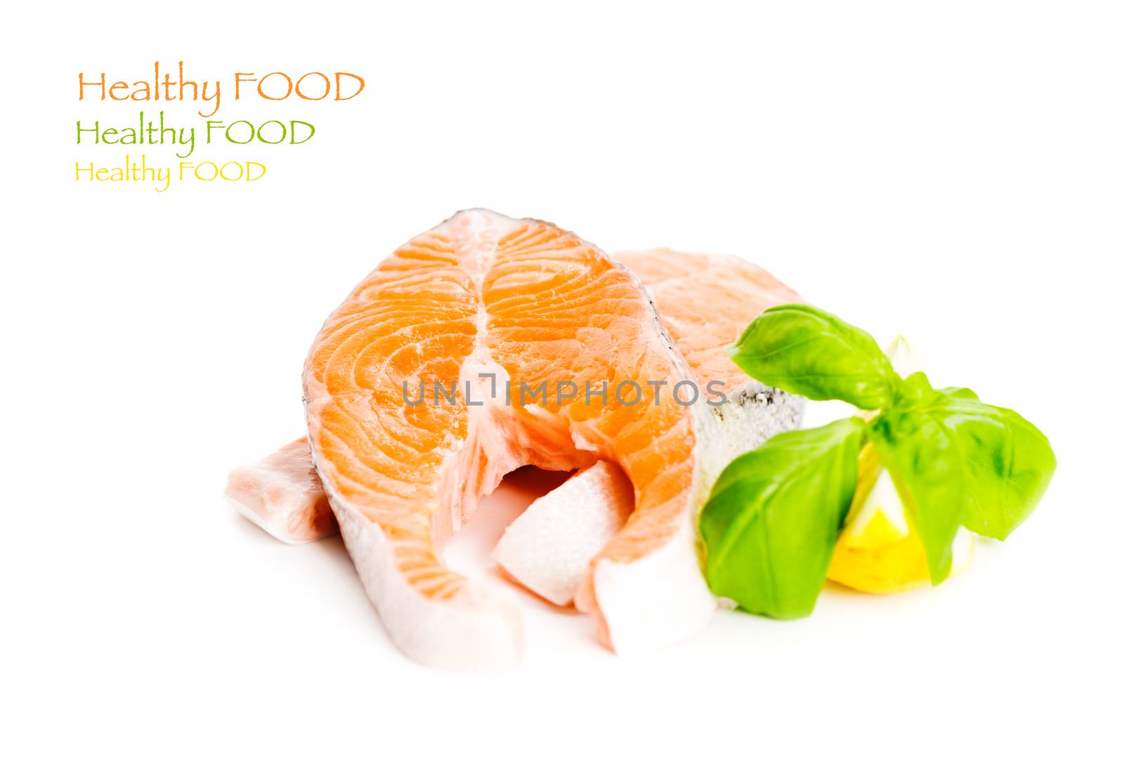 Salmon cuts with basil and lemon isolated on white, copy space