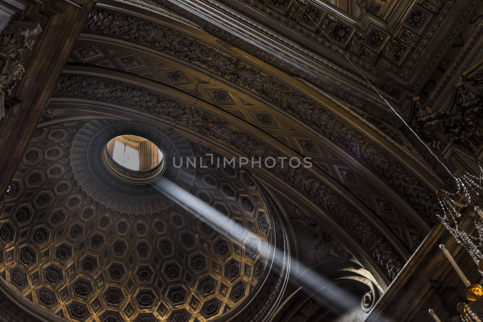 a ray of sunlight in a dark church