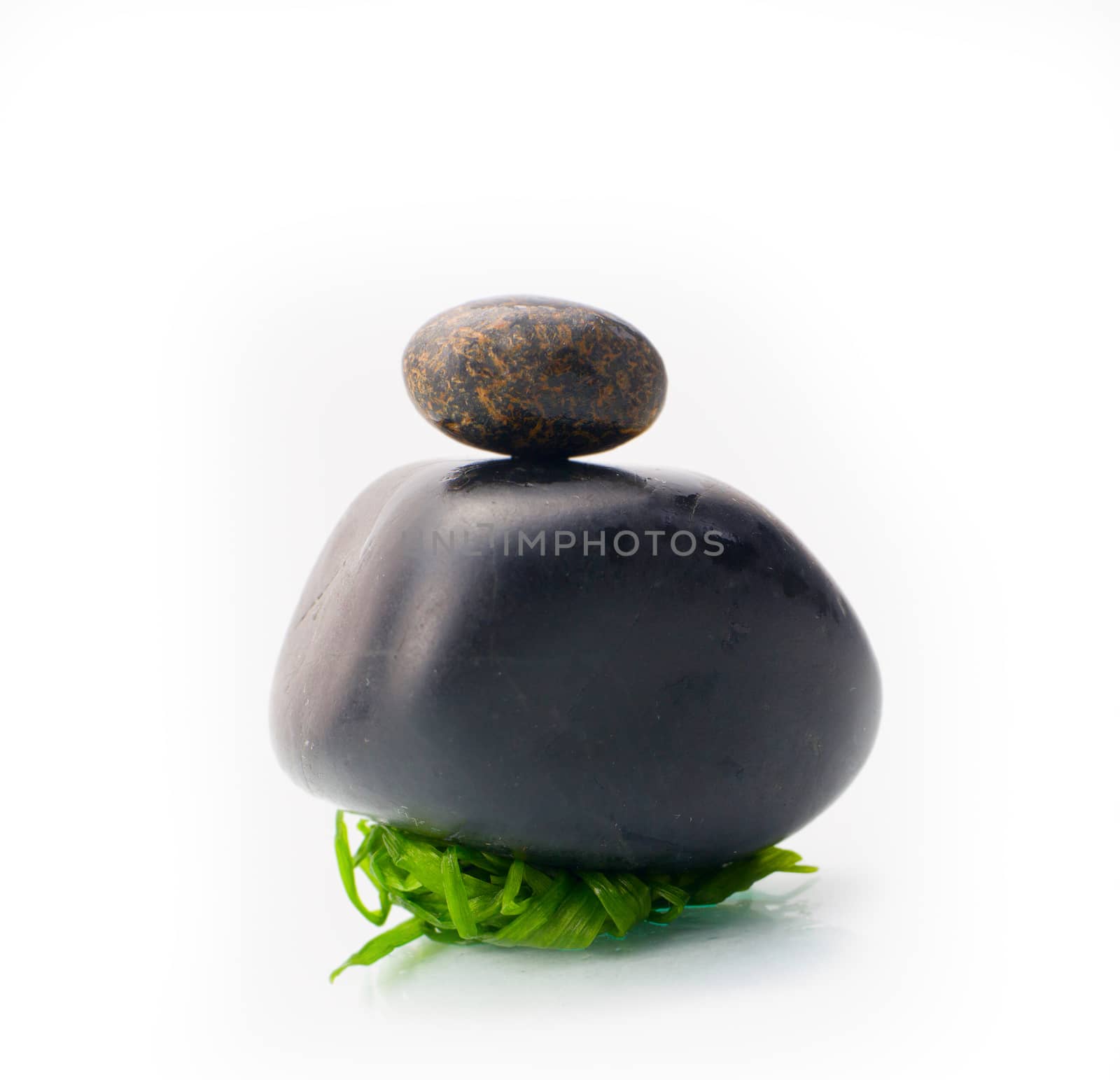 a composition of stone on white background