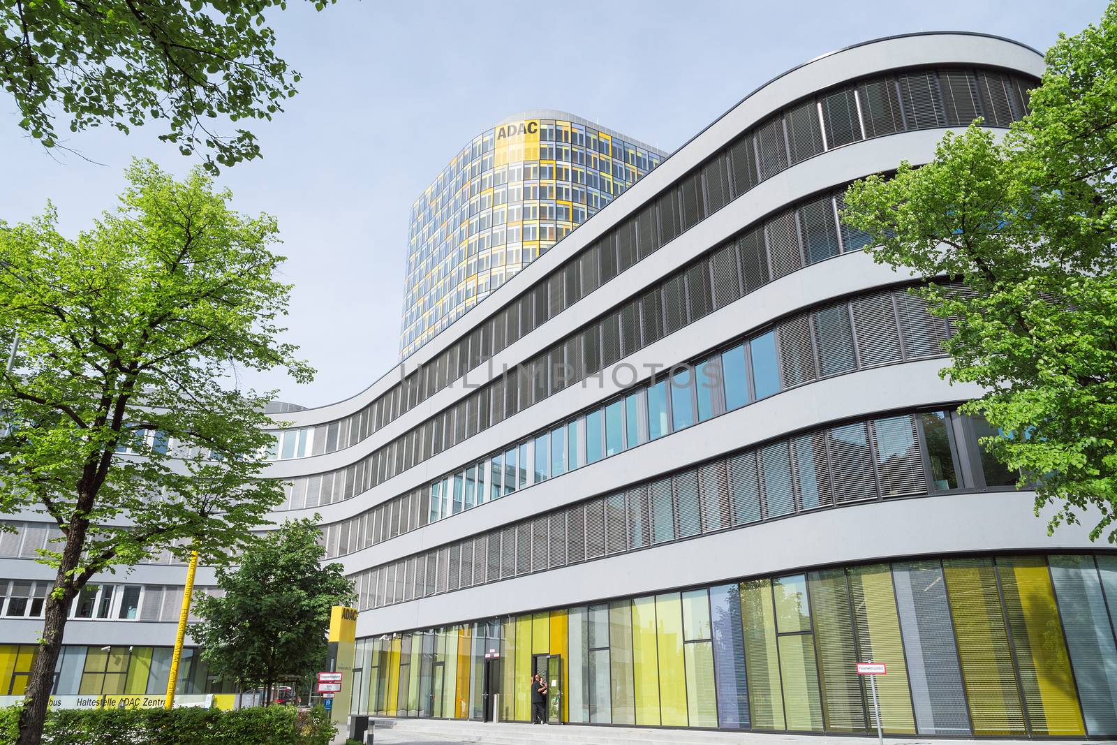 Munich, Germany - May 12, 2015: The new ADAC Headquarters accommodates 2,400 employees who were previously spread across six different locations in Munich.  The 18-storey office tower rises above a 5-storey base. The new building includes conference facilities and a training center, a staff restaurant, a print shop and office space.