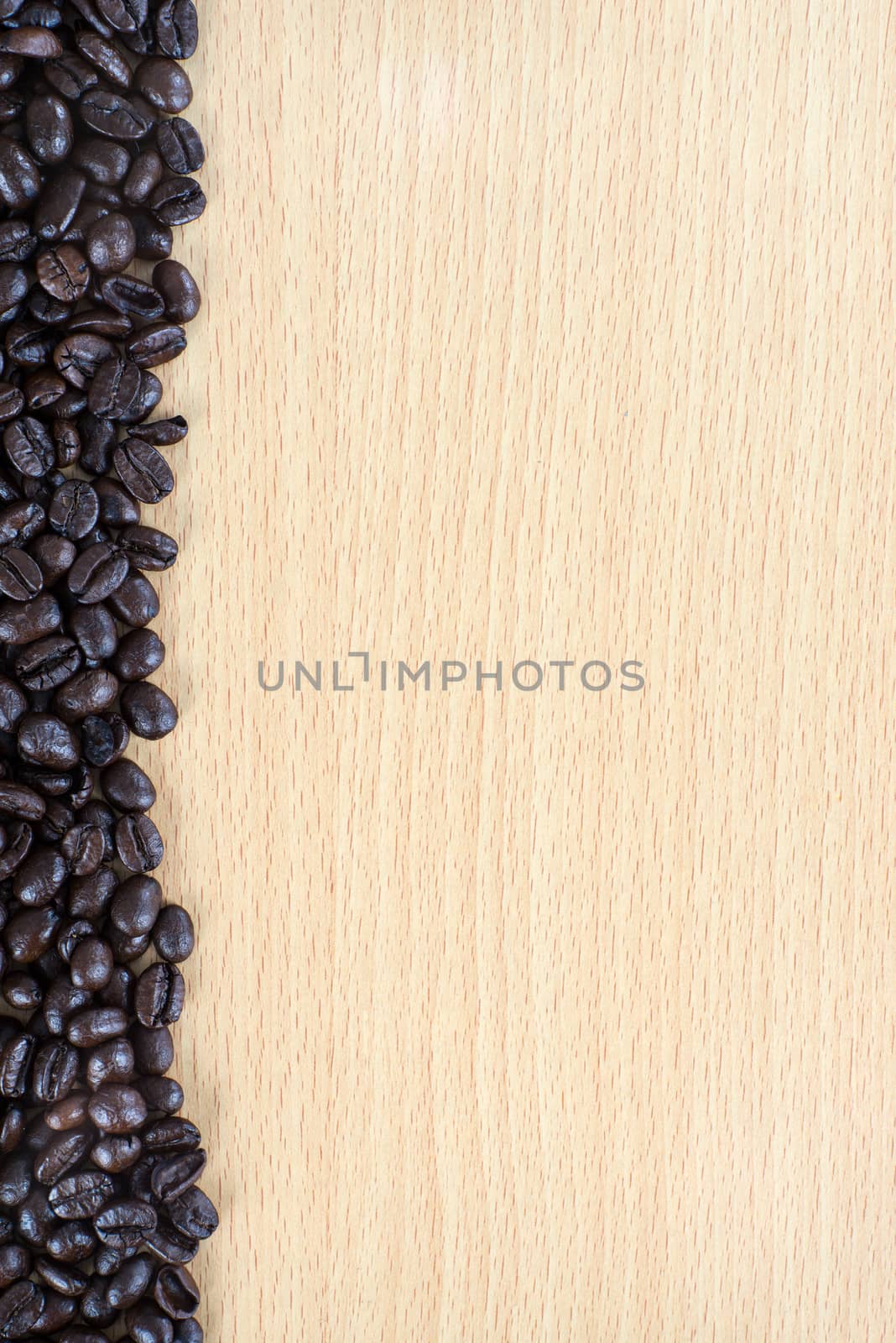 Coffee bean on wood background by iamway